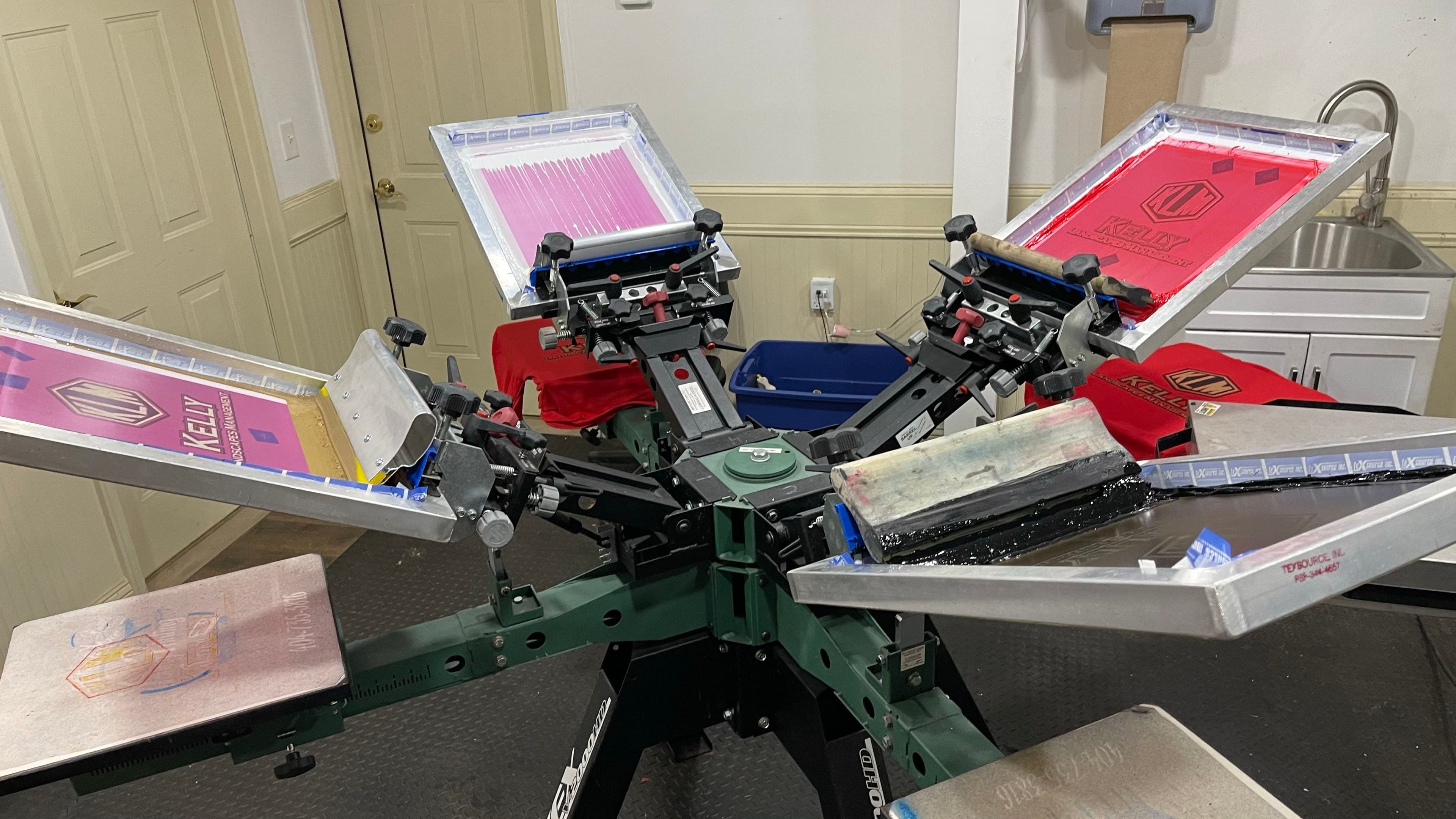 Our 6-arm screen printing press in action